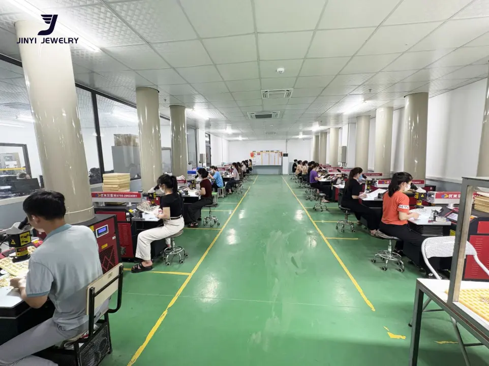 Spacious and clean jewelry manufacturing facility floor at JINYI JEWELRY, showcasing professional large-scale production.