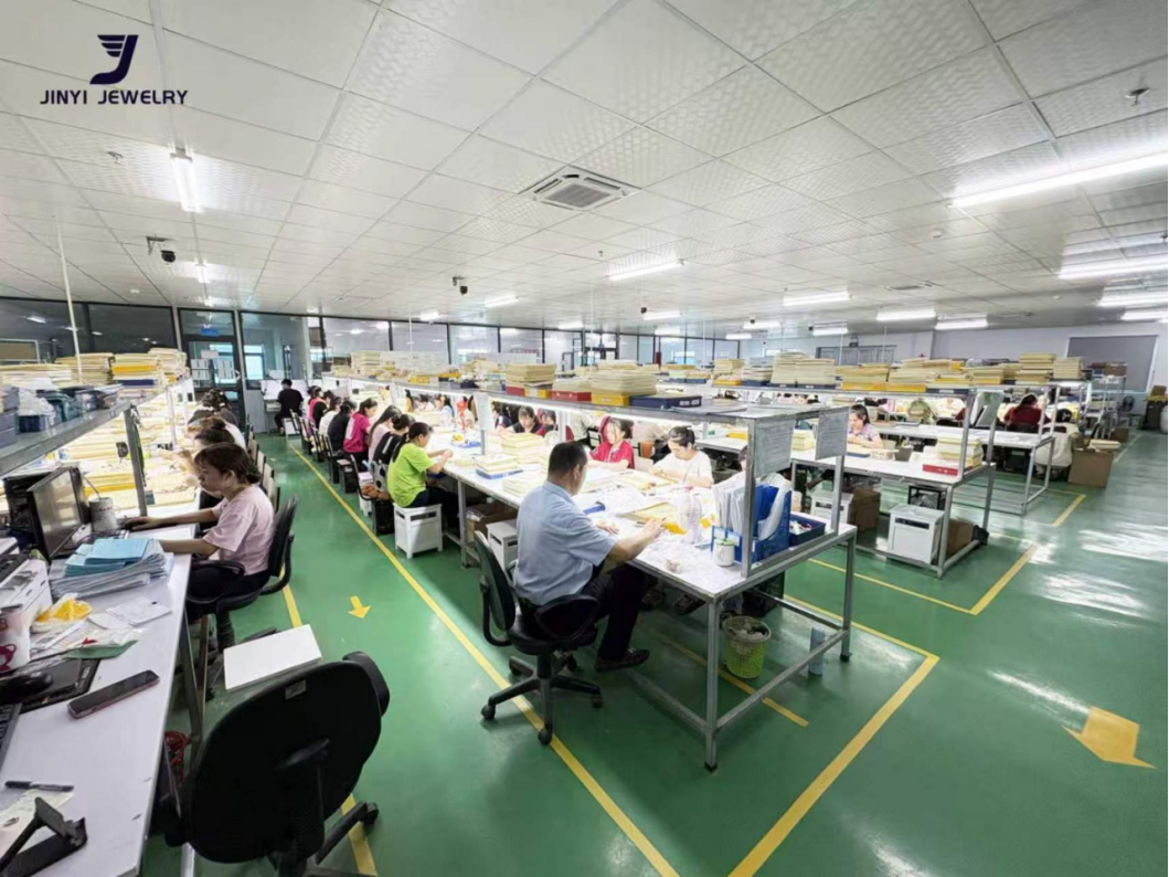 Wide view of JINYI Vietnam jewelry factory with multiple production lines and skilled workers