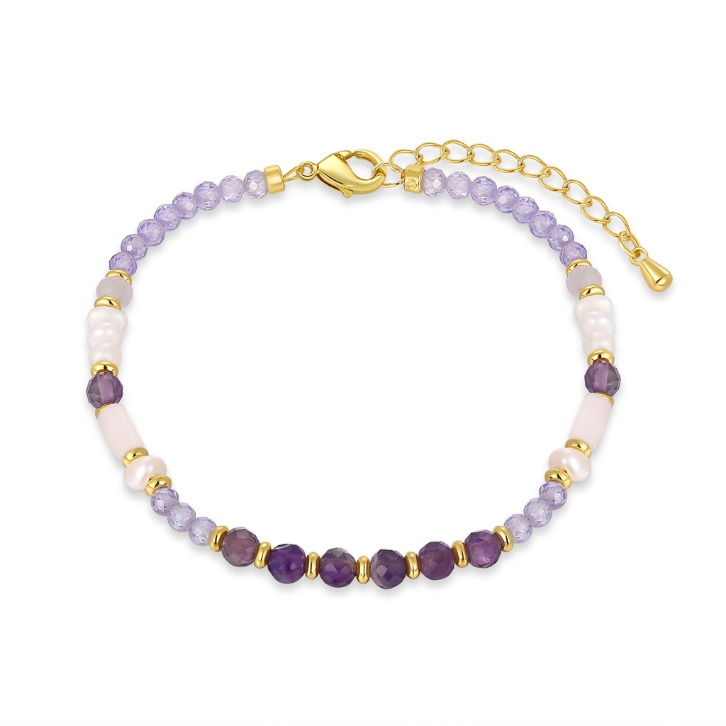 Purple beaded bracelet with pearls, gold spacers, and glass