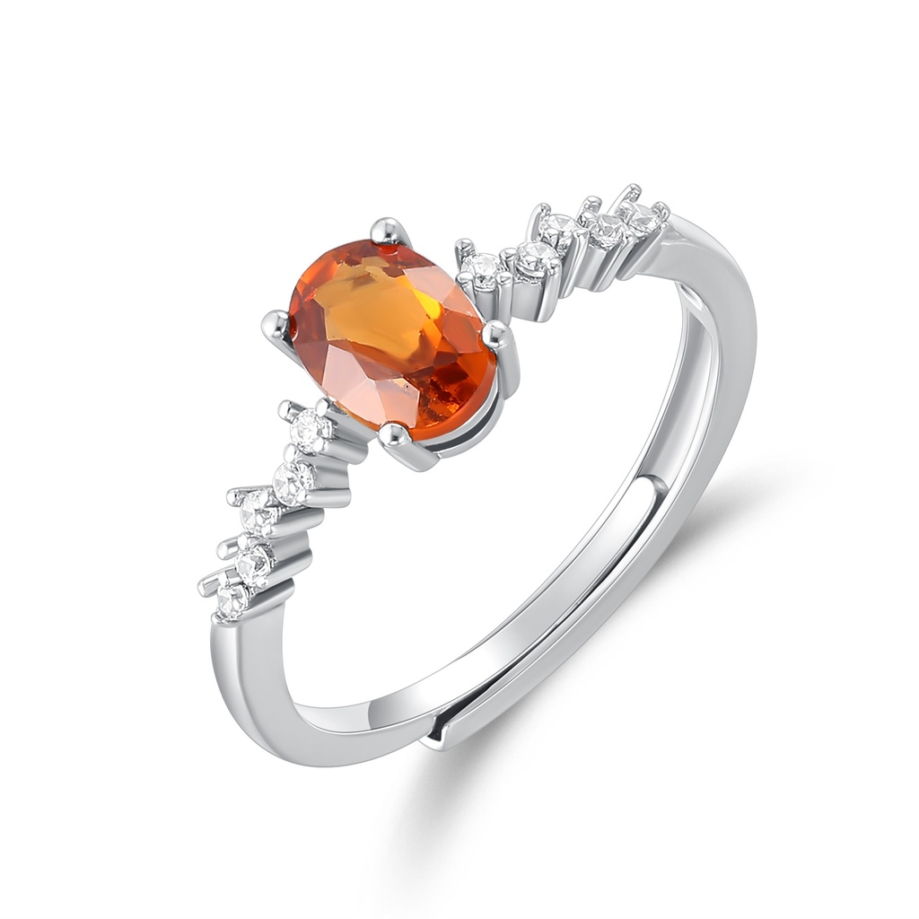 Silver Ring with Oval Orange Gemstone and Sparkling White Accents