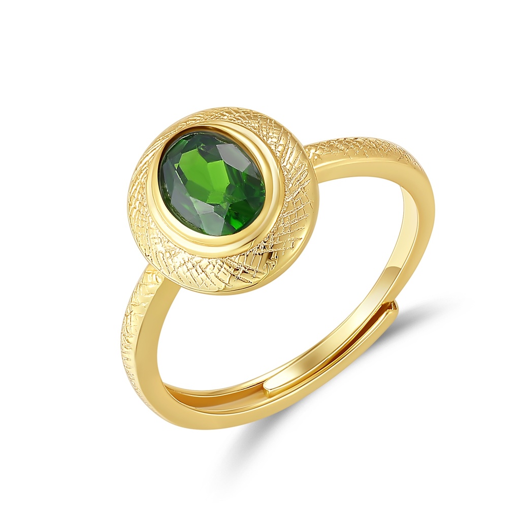 Vintage Gold Ring with Green Gemstone and Textured Design